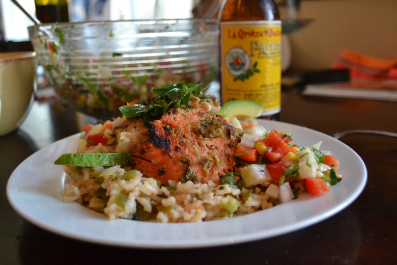Drunken fish over Mexican flavored veggie rice, served with Jicama Salsa