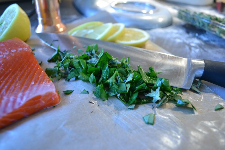 Chopped herbs, ready for their fish-topping destiny
